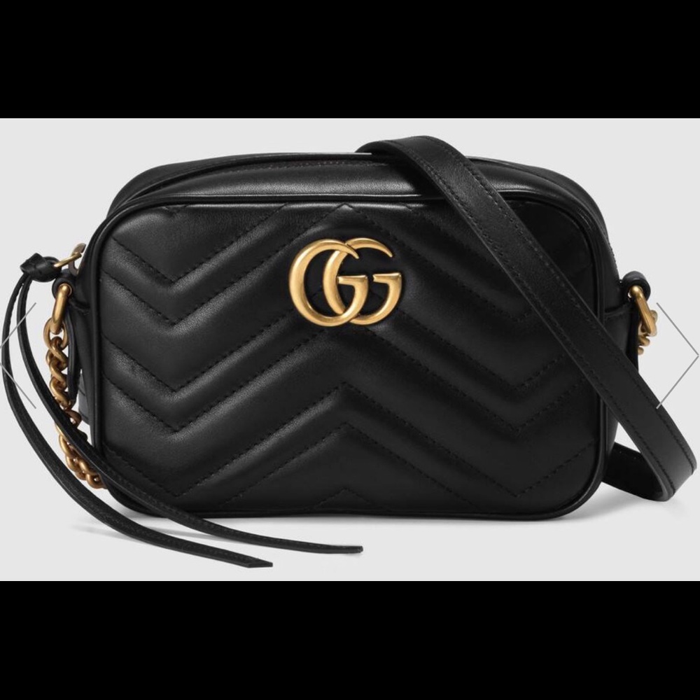Gucci Mini GG Marmont chain shoulder bag.